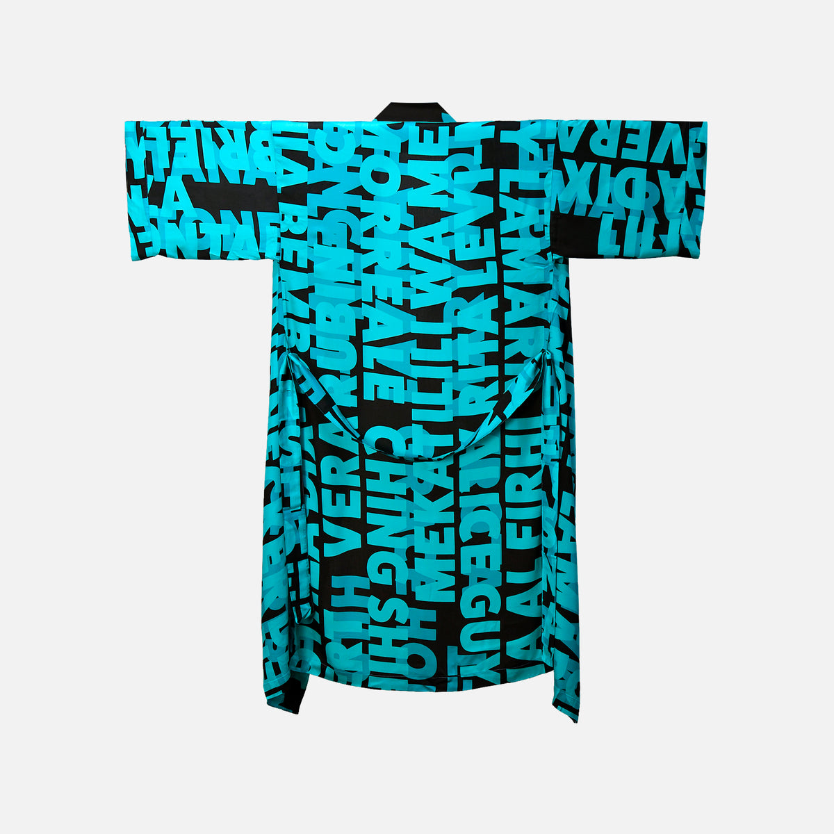 Turquoise and dark brown statement kimono with names of brilliant women in history seen from behind