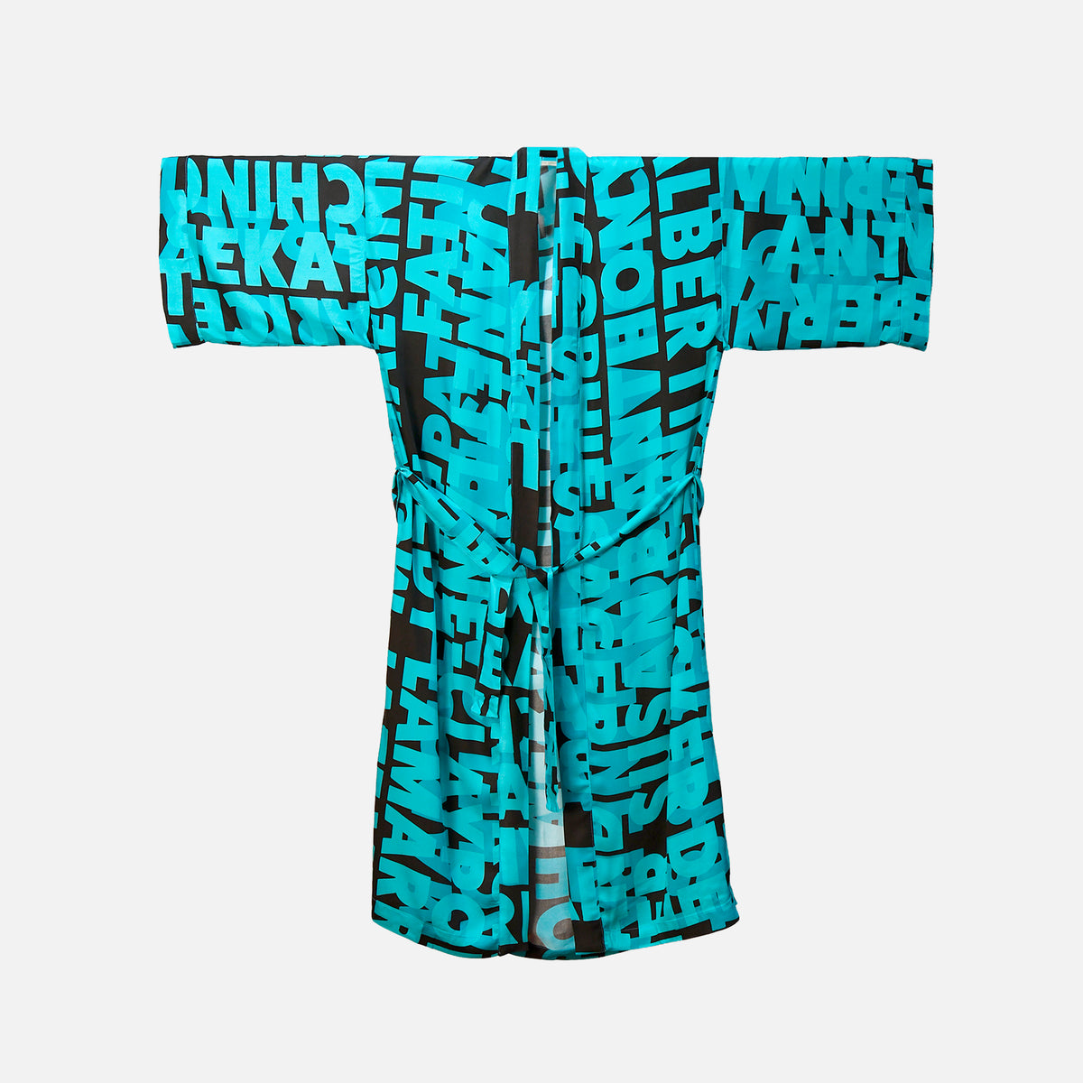 Turquoise and dark brown statement kimono with names of brilliant women in history