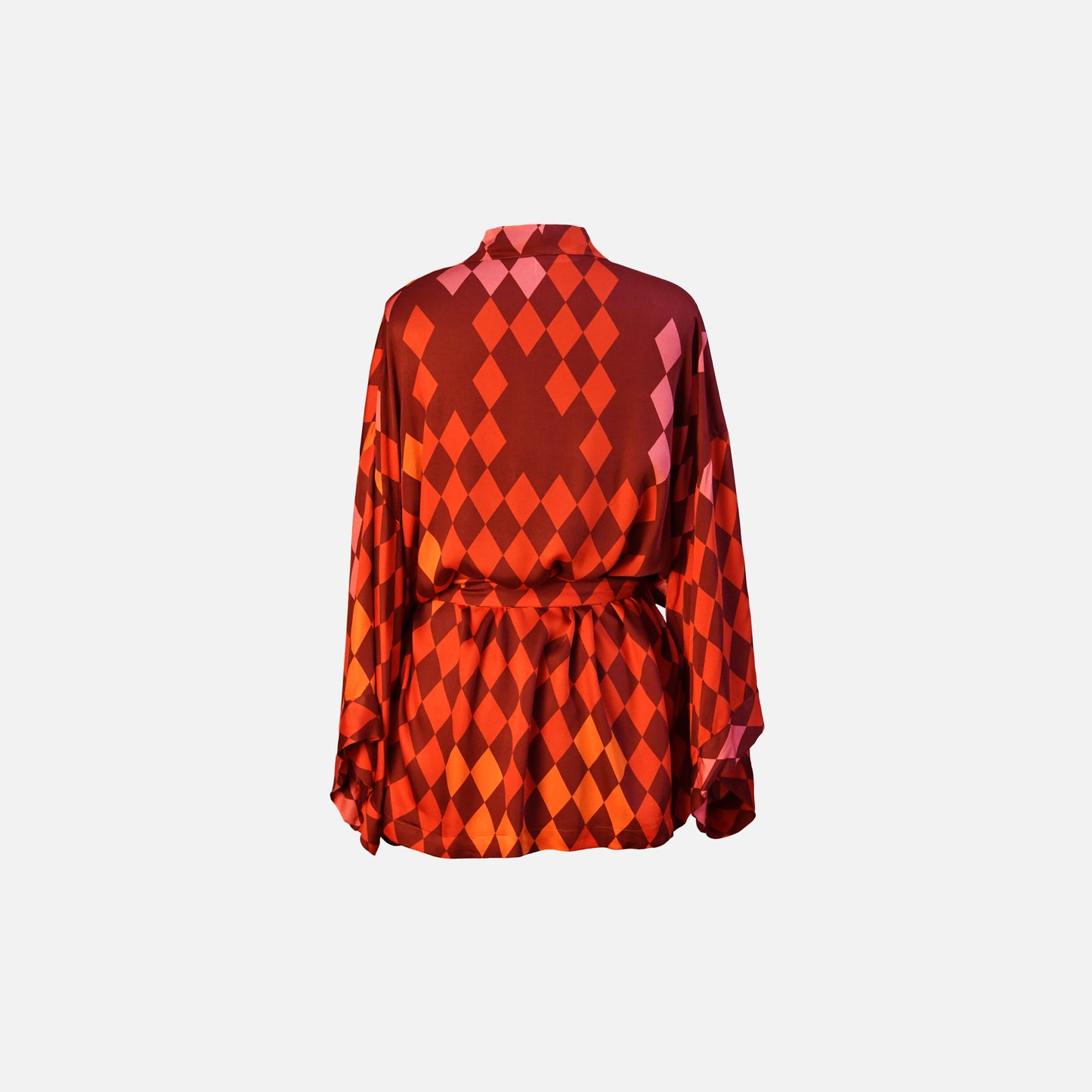 Back view of belted kimono in warm shades of red, pink, orange and terracotta