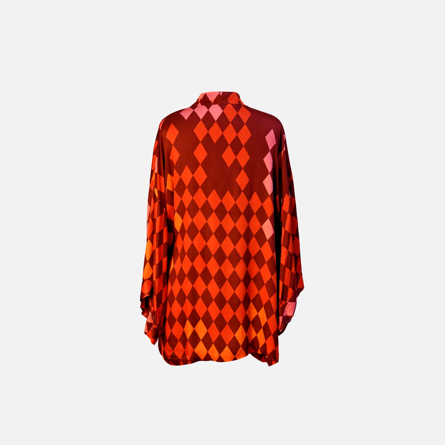 Kimono in warm shades of red, pink, orange and terracotta, back view