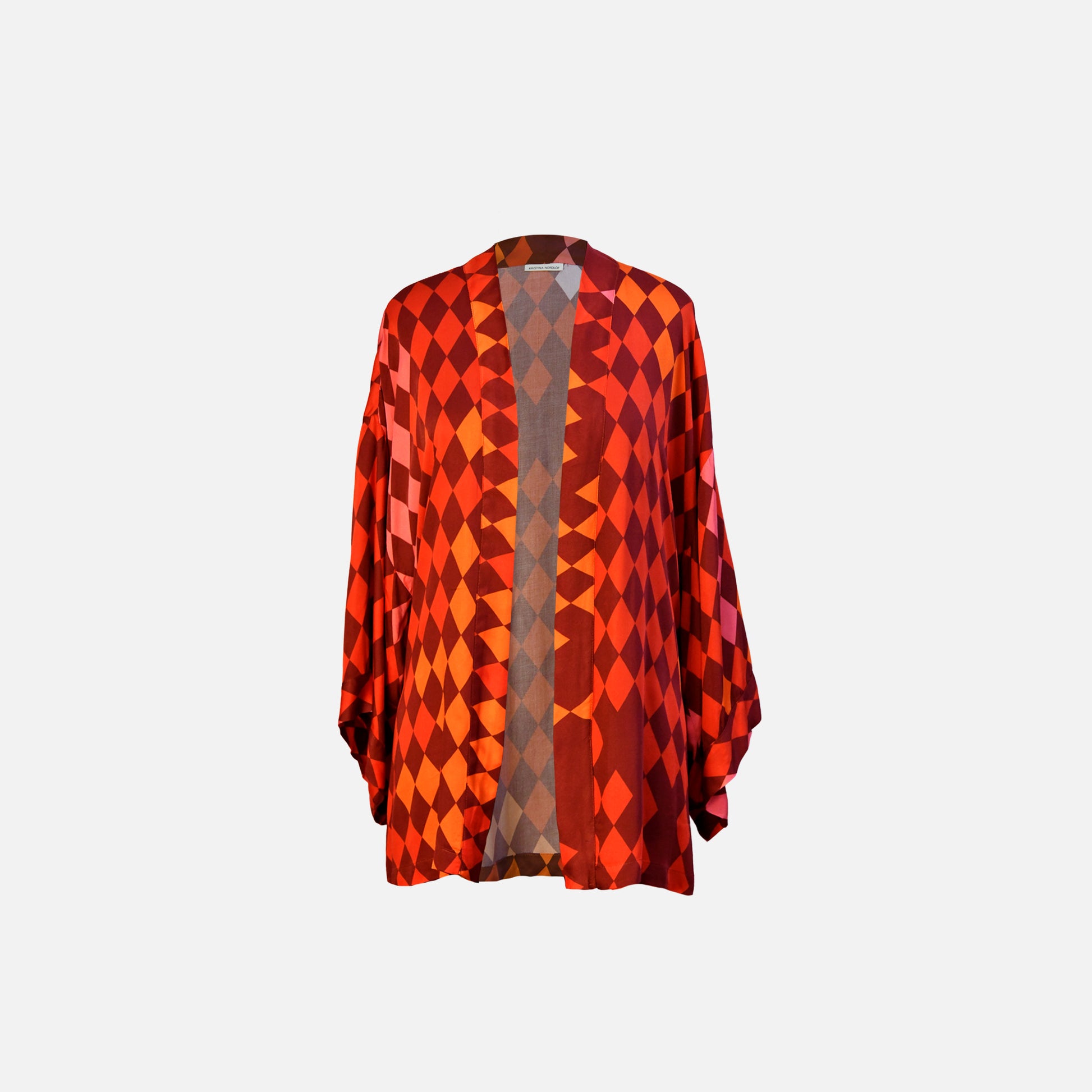 Red and orange patterned kimono-style garment, front